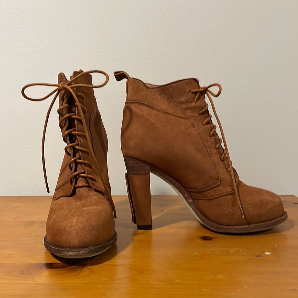 Brown 3” booties. Designer is Vai Via.